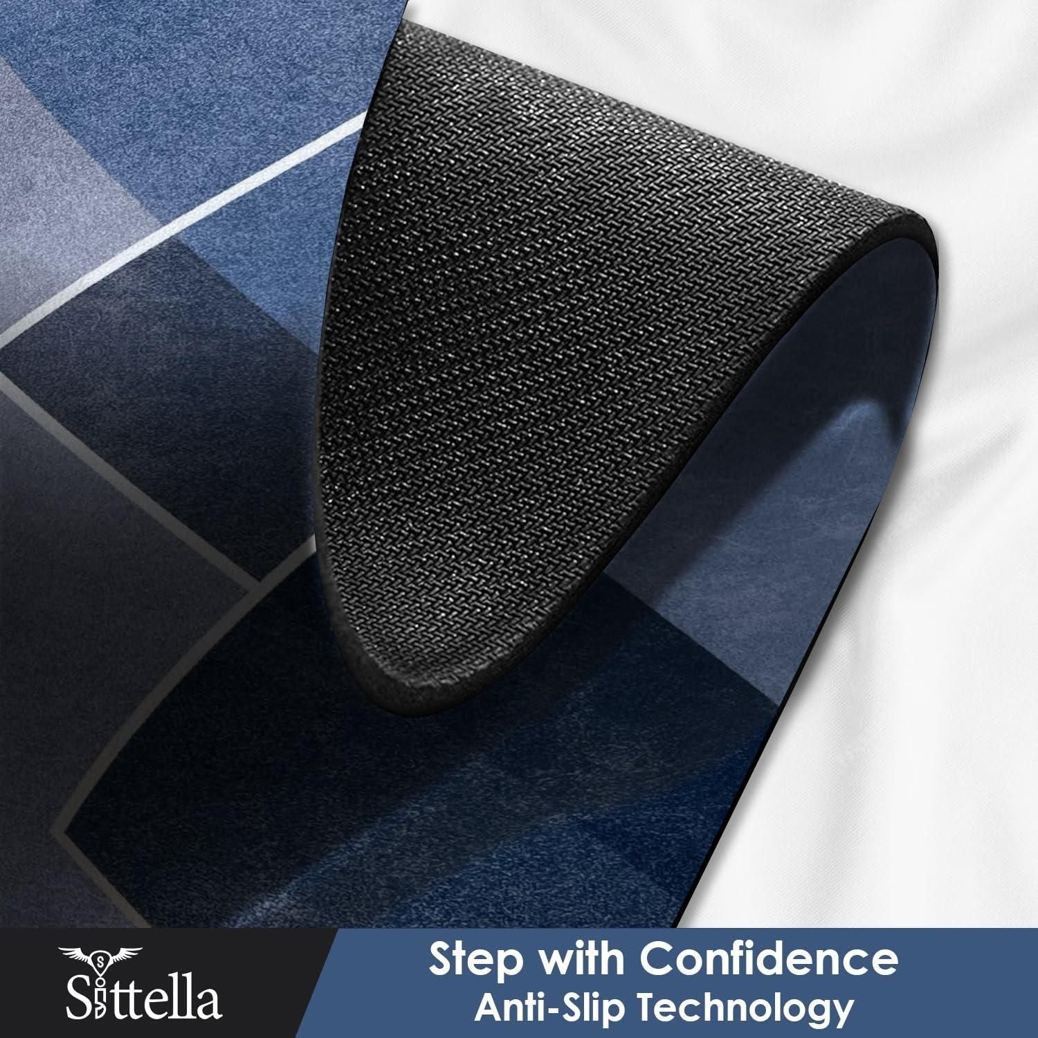 Black anti-slip mat on a blue and white geometric patterned surface with Sittella branding.